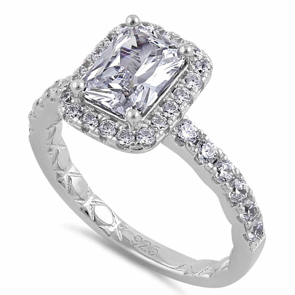 Sterling Silver Emerald Cut CZ halo ring. Size 7p